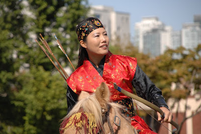 An Altaic Girl in Traditional Dress. Click on image to link to where it is found.