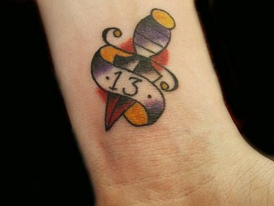 Tibetan dagger tattoo by