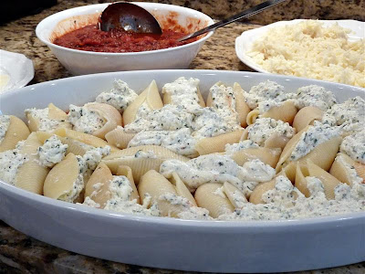 preparing stuffed shells or manicotti