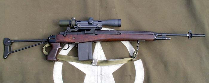 an old M14 with a folding stock and a hunting scope. 