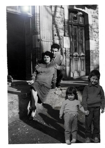 Family in front of the house,  Saint Antonin Noble Val;
