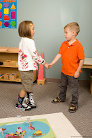 NAMC montessori circle time routines first day welcome songs students shake hands