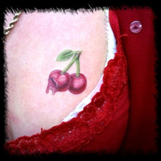 red cherry tattoo