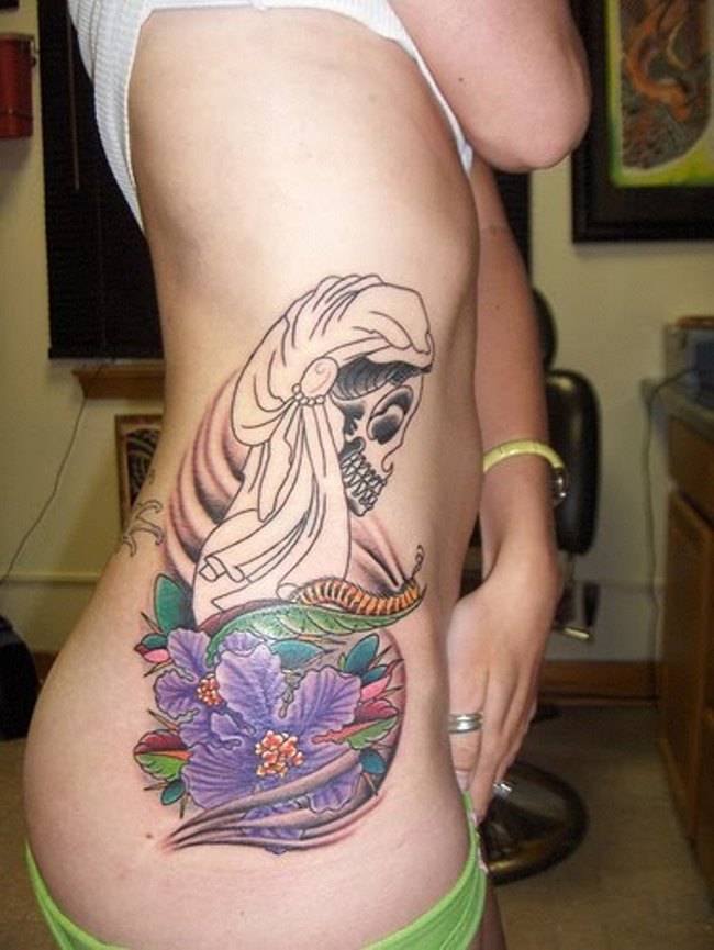 More and more women like to get different sorts of skull tattoos on their