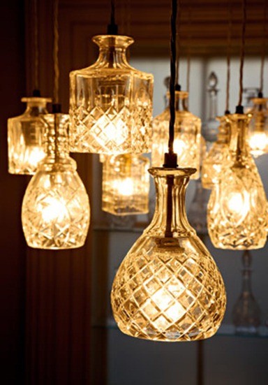 One-of-a-kind DIY lighting fixtures made from upcycled decanters
