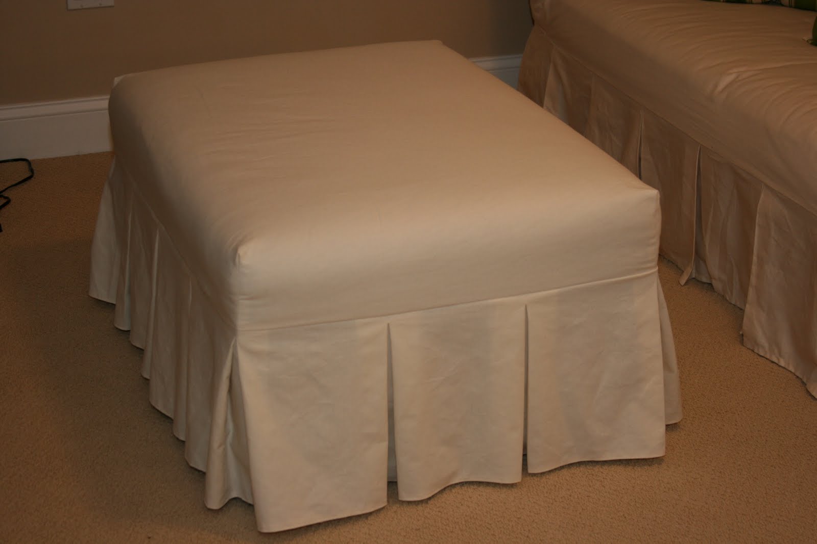 Finished! Ottoman slipcover for the playroom