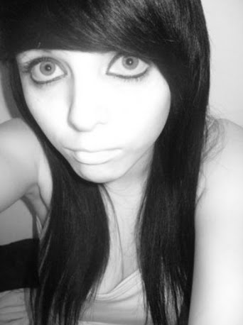 emo eyes makeup. Slick long black emo hairstyle