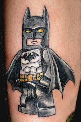 Batman Cartoon Tattoos in arm