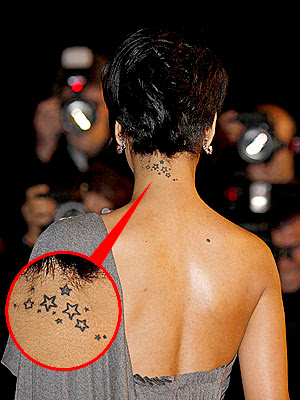 Rihanna's sexy back tattoos photos