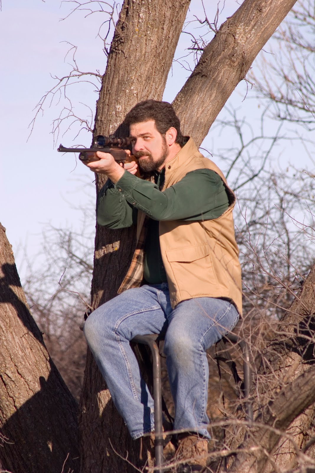 santa hunting in tree stand. santa hunting in tree stand.