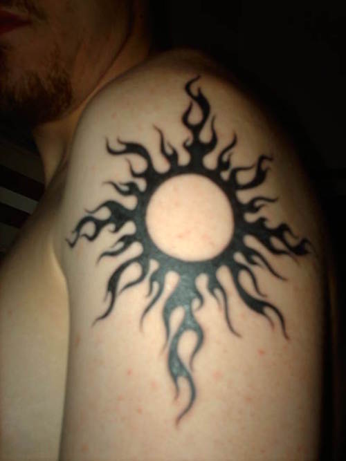 Both way, a Tribal sun tattoos style will make the bearer stand out simply 