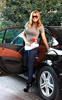 Carmen Electra And Her Sweater Stretching Puppies