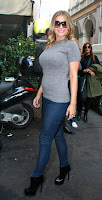 Carmen Electra And Her Sweater Stretching Puppies