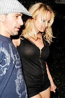 Pamela Anderson’s Nipple Is Making A Break For It