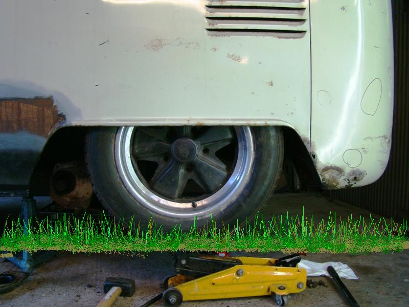 [porscha+rear+wheels+trial+fit+with+grass.JPG]