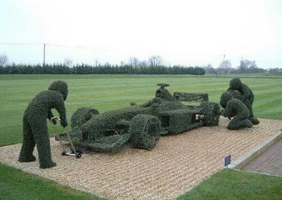 grass sculpture of racing car