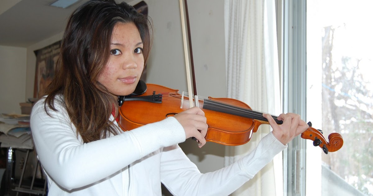 Music Lessons in Toronto Joanne Loves to practice her violin