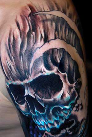 skeleton tattoo designs. flaming skull tattoos.