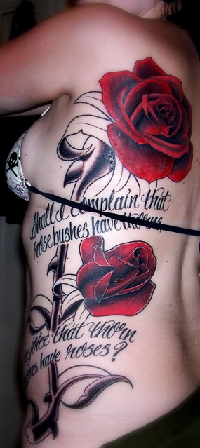 human heart tattoos. rose and heart tattoos