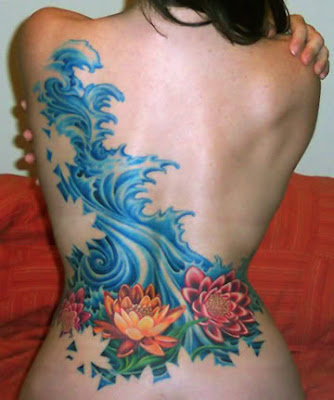 Flower Tattoo Design on Girl's Sexy Body. The Flowers beautify the water