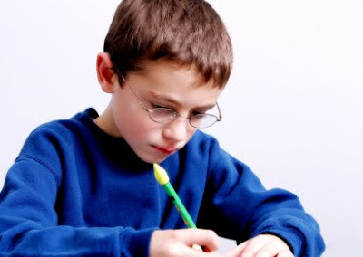 NAMC montessori activities for children's day boy writing a letter