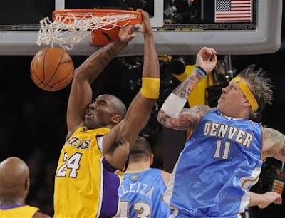 lebron james dunk over kobe. lebron james dunking on kobe bryant. lebron james dunk over kobe.