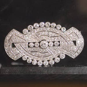 deco jewelry geometric inspired shapes lines hardware cabinet roaring research project brooch christie grace think 1920 era luxury 1920s classic