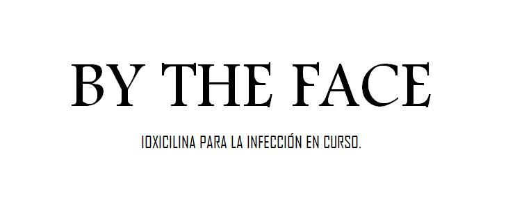 by the face