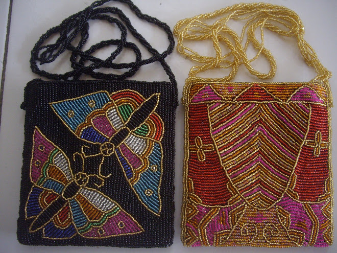 Handcrafted and Sewn, Brilliantly Colored Beadwork, Hand Bag.  Model on Left--Butterfly Design