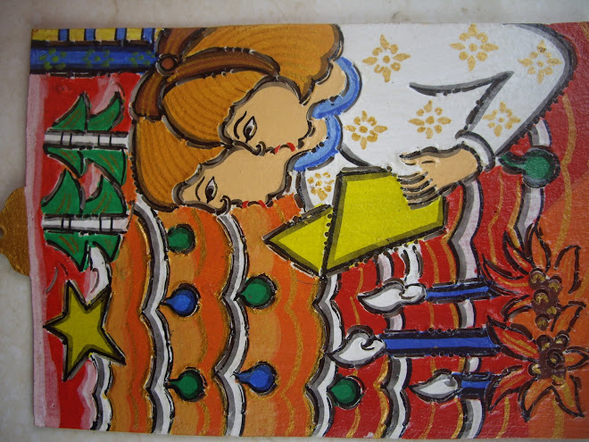 CHRISTMAS CAROLLERS--RED AND ORANGE COLOR SCHEME.  HANDMADE IN BALI