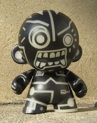 Warlock Munny by Bleeding Edges, made with masking tape and spray paint.