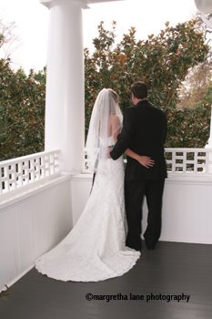 bride & groom on balcony