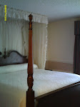 Four-poster bed with canopy