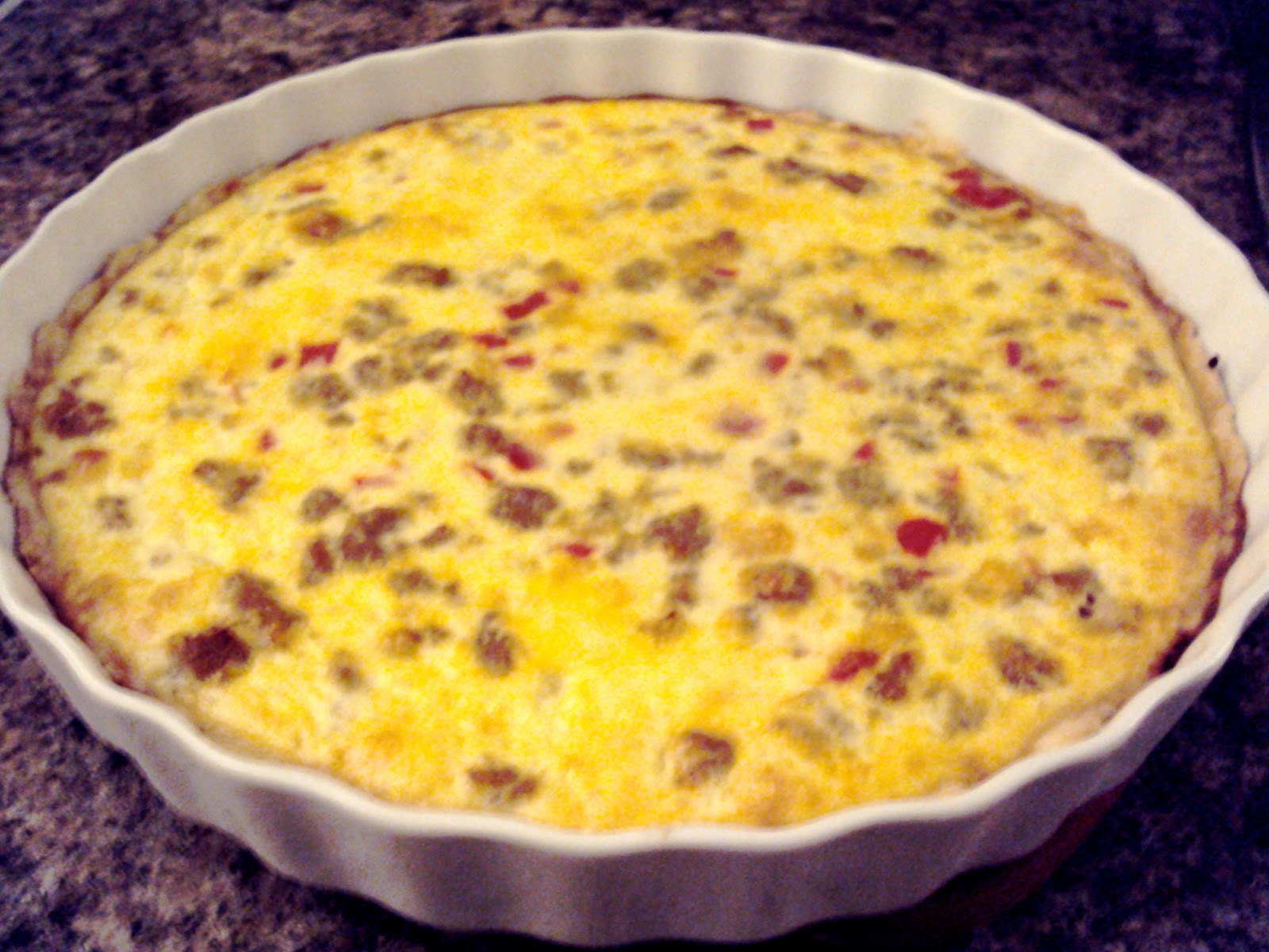 Squirrel Bakes Sausage, Red Bell Pepper, and Gruyere Quiche
