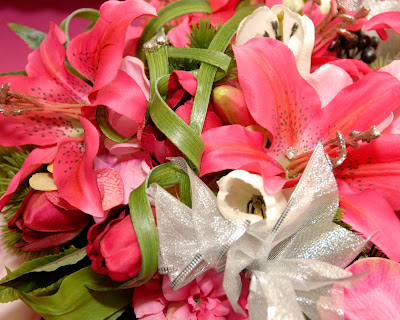 The Centerpieces consisted of Pink and white Tulips medium pink Roses