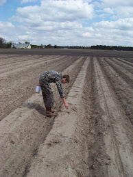 Hunter planting watermelon seeds