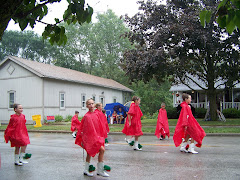 baton group pass by in the rain