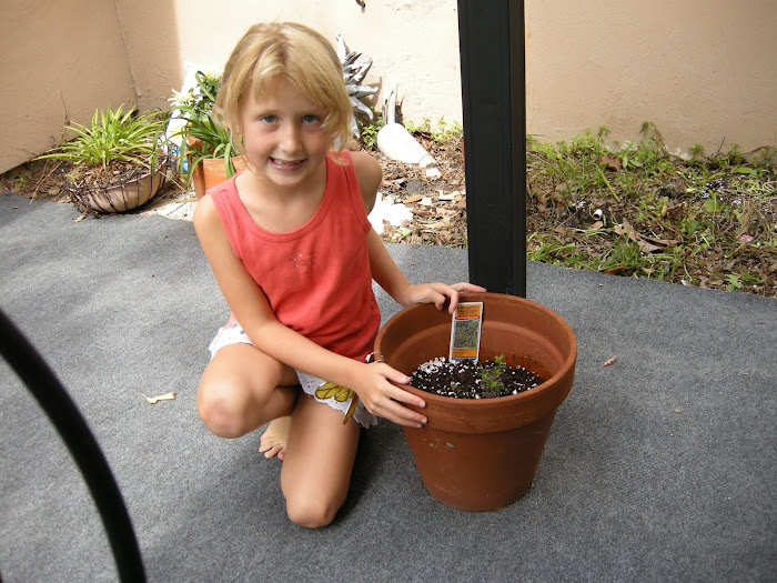 Grace with her very own plant