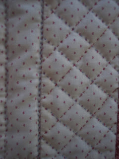 Quilt in Pink made of Squares