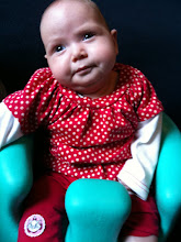 Big girl sitting in her bumbo (July 09, sadly she can't sit this well in it anymore)