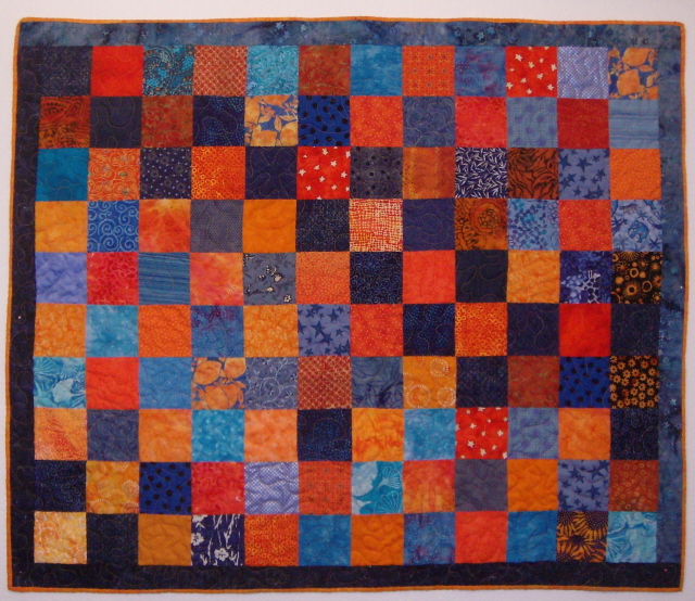 [orange+and+blue+quilt+finished.jpg]