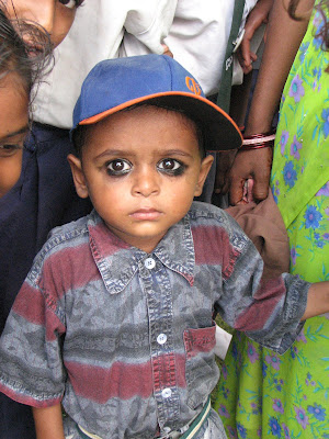 In India the oldest caste rim their children's eyes with kohl,
