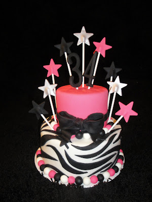 This pink & zebra striped cake is a pretty darn cute and very popular design 