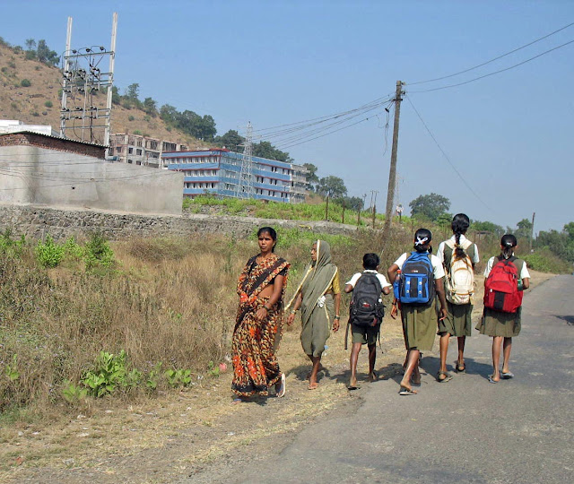children walking to school in rural india