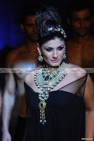 Raveena Tandon walks with Black outfit and Jewellery for Raj Mahtani at HDIL Fashion Show