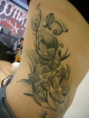 Daisy+tattoos+on+side