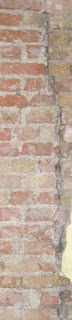 Oh my poor wall Picture of cracked brickwork
