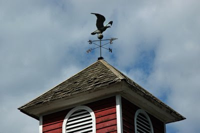 a copper eagle weathervane follows the wind at the Shelburne Museum