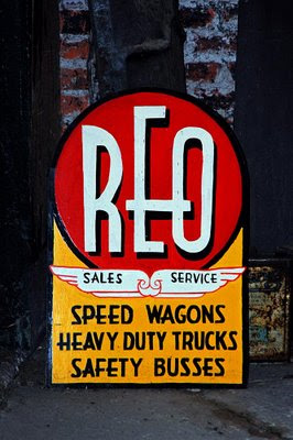 a colorful old advertising sign for a motor company is one of many artifacts to find at Hancock Shaker Village