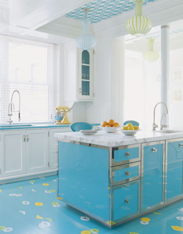 Turquoise kitchen with  matching island, floor and painted ceiling